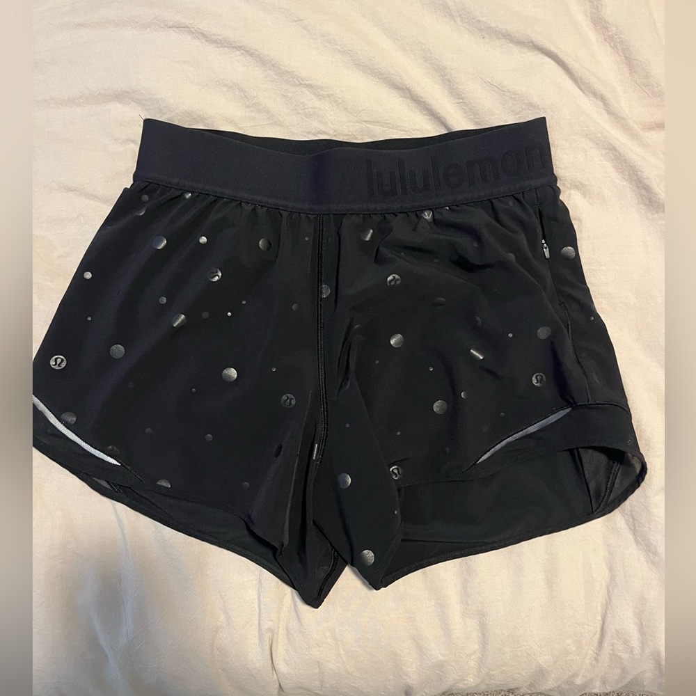 Black lulu shorts with logo detail all over.